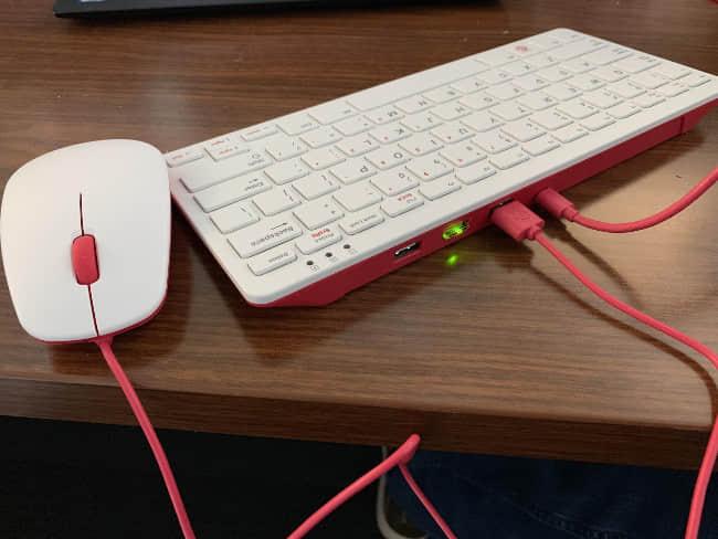 Official Raspberry Pi keyboard (with YubiKey plugged in) and mouse. Official Raspberry Pi keyboard (with YubiKey plugged in) and mouse.
